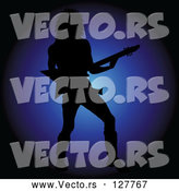 Vector of Silhouetted Rock Star Guy Playing an Electric Guitar over Blue by Pams Clipart